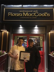 Russell Scott presents Tyler Kitchen the 11,000th Food Safety 1st certificate.