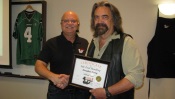 Russell Scott presents Douglas Terry of Melfort Sask. the 9,000th Food Safety 1st certificate.